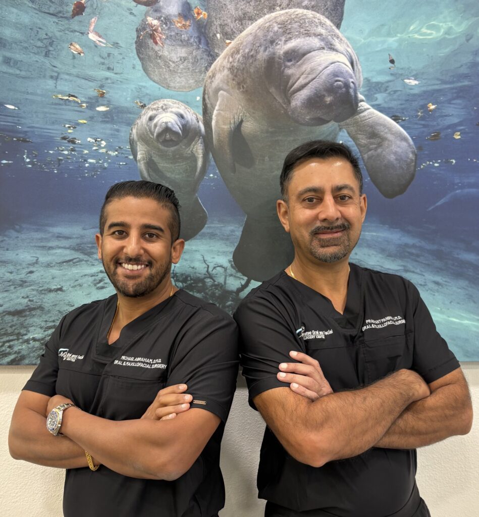 Dr. Michael Abraham, D.M.D. and Dr. Prashant Pandya, D.M.D. of Manatee Oral and Facial Surgery Center in Bradenton Florida